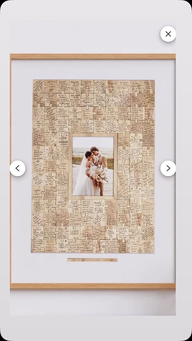 Framed wedding photo surrounded by jigsaw puzzle pieces with handwritten guest messages.